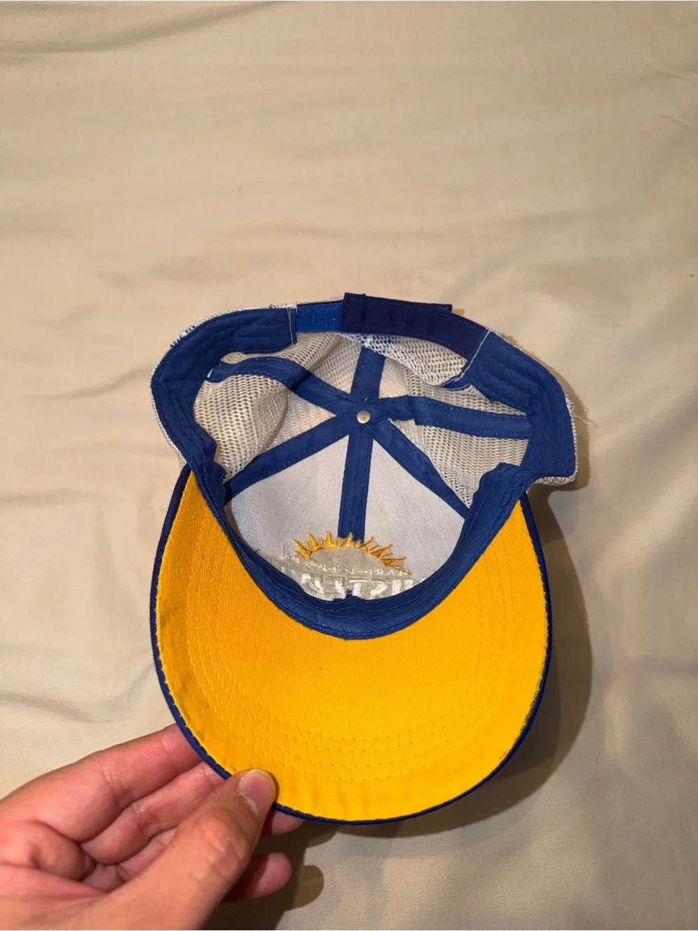 Twisted Tea Royal Blue and White Mesh Trucker Hat with Sun Logo